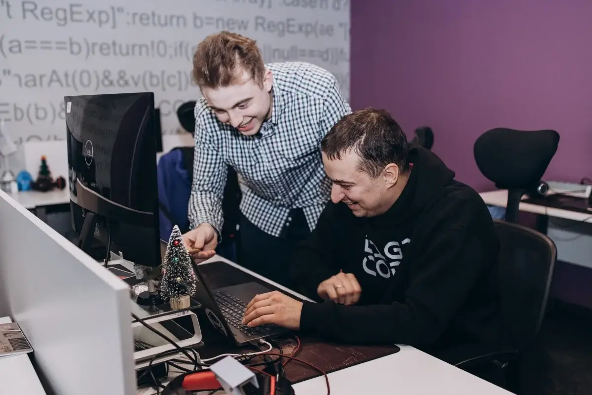 two developers near laptop