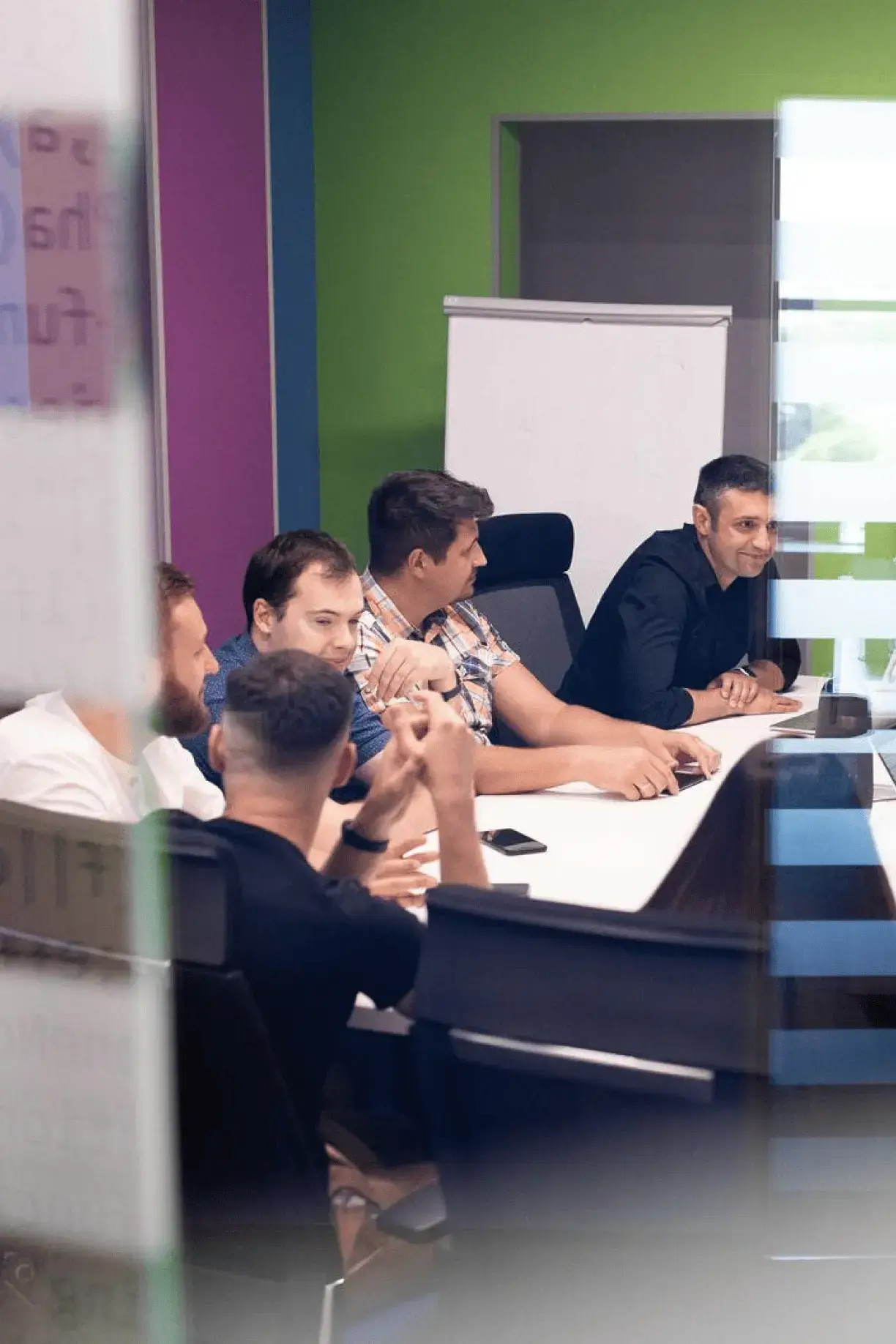 coworkers in the meeting room during discussion