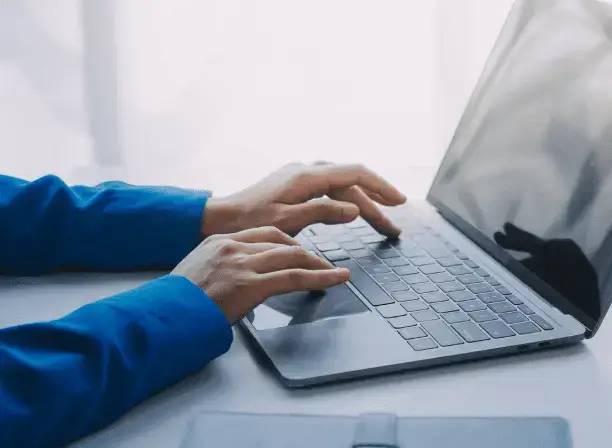 hands over the laptop